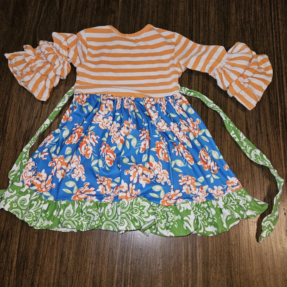 Vibrant Kids Dress with Orange Stripes and Floral Design